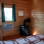 Queen bedroom with stove